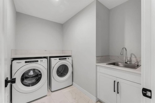 45 Carringsby Landing Nw, Calgary, AB - Indoor Photo Showing Laundry Room