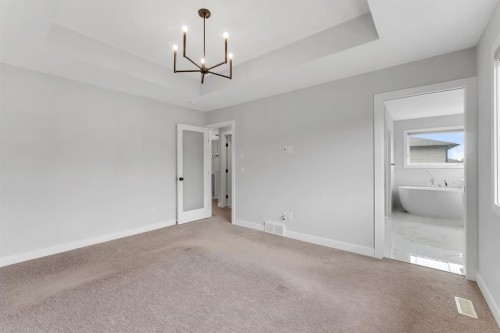 45 Carringsby Landing Nw, Calgary, AB - Indoor Photo Showing Other Room