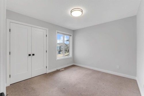 45 Carringsby Landing Nw, Calgary, AB - Indoor Photo Showing Other Room