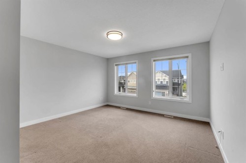 45 Carringsby Landing Nw, Calgary, AB - Indoor Photo Showing Other Room