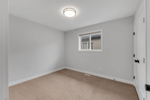 45 Carringsby Landing Nw, Calgary, AB - Indoor Photo Showing Other Room