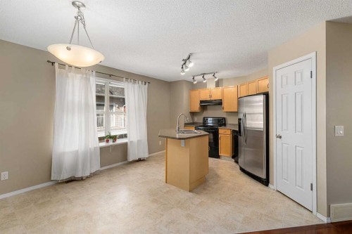 205 Mckenzie Towne Gate Se, Calgary, AB - Indoor Photo Showing Kitchen