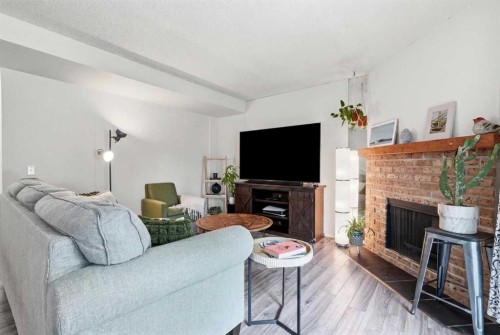 6503 Ranchview Drive Nw, Calgary, AB - Indoor Photo Showing Living Room With Fireplace