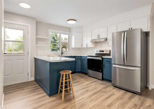 7956 71 Avenue Nw, Calgary, AB - Indoor Photo Showing Kitchen With Stainless Steel Kitchen