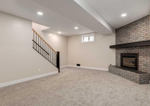7956 71 Avenue Nw, Calgary, AB - Indoor With Fireplace