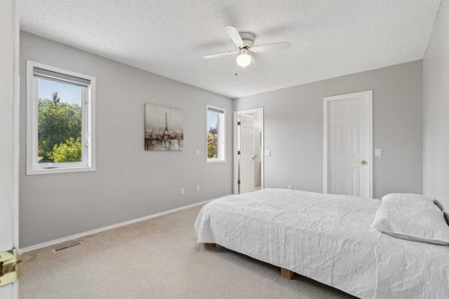 10433 Hidden Valley Drive Nw, Calgary, AB - Indoor Photo Showing Bedroom
