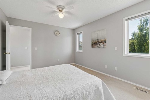 10433 Hidden Valley Drive Nw, Calgary, AB - Indoor Photo Showing Bedroom