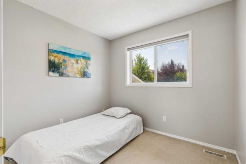 10433 Hidden Valley Drive Nw, Calgary, AB - Indoor Photo Showing Bedroom
