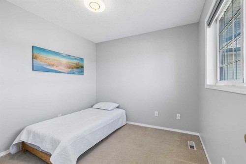 10433 Hidden Valley Drive Nw, Calgary, AB - Indoor Photo Showing Bedroom