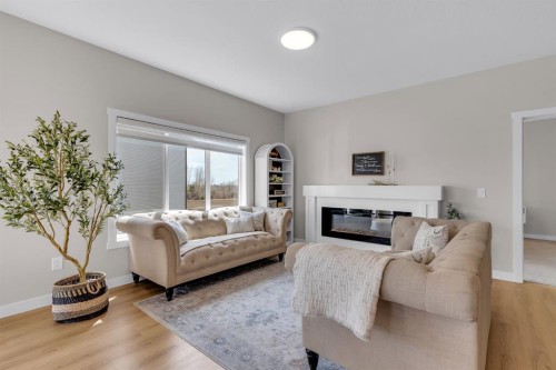 315 Monterey Place Se, High River, AB - Indoor Photo Showing Living Room With Fireplace