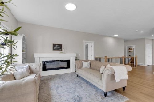 315 Monterey Place Se, High River, AB - Indoor Photo Showing Living Room With Fireplace