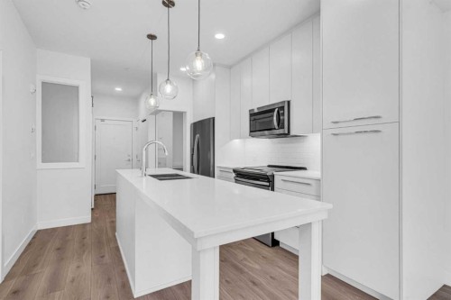 1119-76 Cornerstone Passage Ne, Calgary, AB - Indoor Photo Showing Kitchen With Upgraded Kitchen