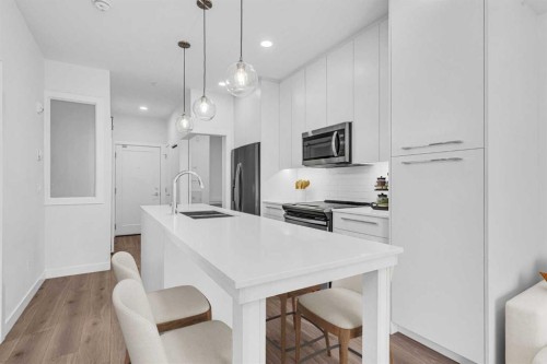 1119-76 Cornerstone Passage Ne, Calgary, AB - Indoor Photo Showing Kitchen With Upgraded Kitchen