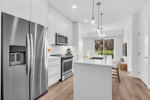 1119-76 Cornerstone Passage Ne, Calgary, AB - Indoor Photo Showing Kitchen With Upgraded Kitchen