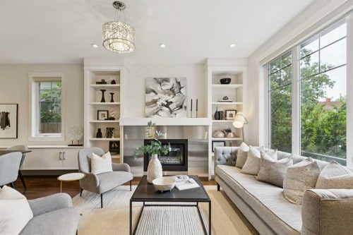 1-922 3 Avenue Nw, Calgary, AB - Indoor Photo Showing Living Room With Fireplace