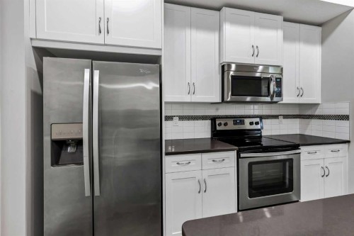 540 Evanston Link Nw, Calgary, AB - Indoor Photo Showing Kitchen With Stainless Steel Kitchen With Upgraded Kitchen