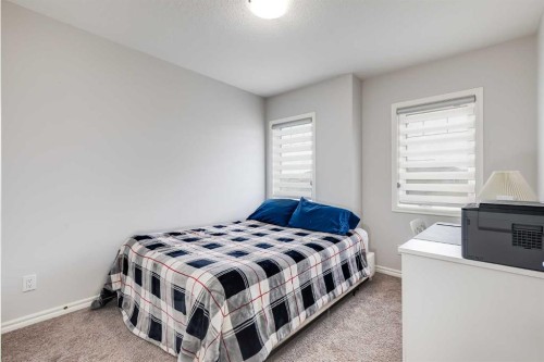 540 Evanston Link Nw, Calgary, AB - Indoor Photo Showing Bedroom