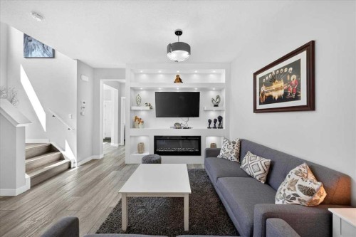 190 Cornerstone Crescent Ne, Calgary, AB - Indoor Photo Showing Living Room With Fireplace