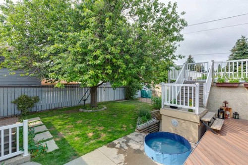 107 Bermuda Drive Nw, Calgary, AB - Outdoor With Deck Patio Veranda With Backyard