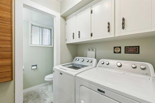 323 Ranchview Place Nw, Calgary, AB - Indoor Photo Showing Laundry Room