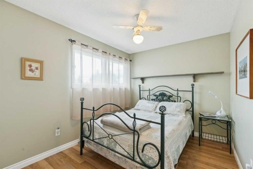 323 Ranchview Place Nw, Calgary, AB - Indoor Photo Showing Bedroom