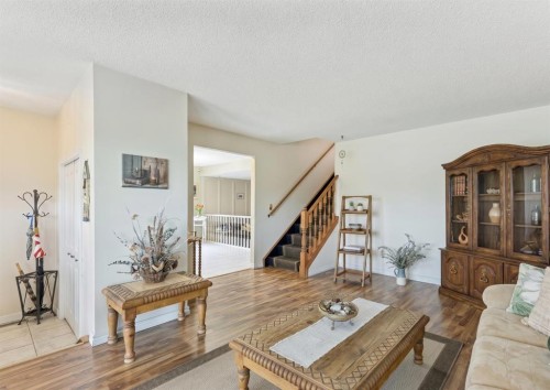 323 Ranchview Place Nw, Calgary, AB - Indoor Photo Showing Living Room