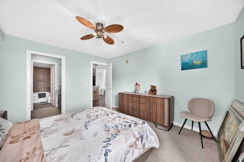 208-30 Cranfield Link Se, Calgary, AB - Indoor Photo Showing Bedroom
