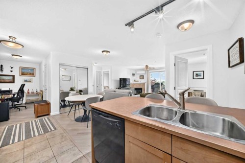 208-30 Cranfield Link Se, Calgary, AB - Indoor Photo Showing Kitchen With Double Sink