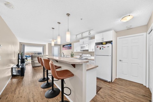 2133-700 Willowbrook Road Nw, Airdrie, AB - Indoor Photo Showing Kitchen