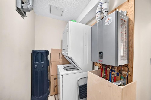 2133-700 Willowbrook Road Nw, Airdrie, AB - Indoor Photo Showing Laundry Room