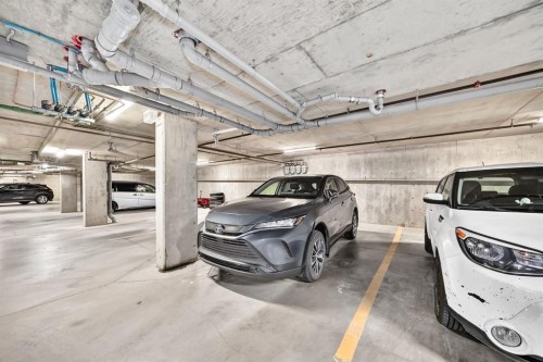 2133-700 Willowbrook Road Nw, Airdrie, AB - Indoor Photo Showing Garage