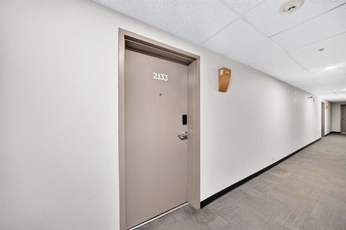 2133-700 Willowbrook Road Nw, Airdrie, AB - Indoor Photo Showing Other Room