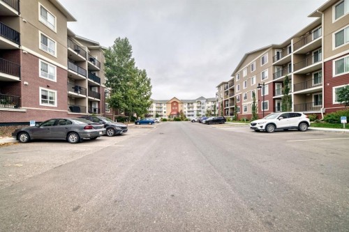 2133-700 Willowbrook Road Nw, Airdrie, AB - Outdoor With Balcony With Facade