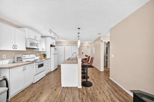 2133-700 Willowbrook Road Nw, Airdrie, AB - Indoor Photo Showing Kitchen