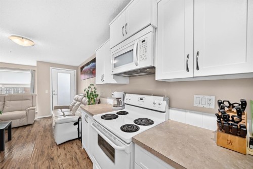 2133-700 Willowbrook Road Nw, Airdrie, AB - Indoor Photo Showing Kitchen