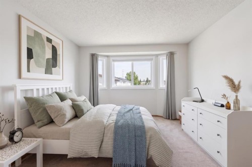 151 Rivercrest Close Se, Calgary, AB - Indoor Photo Showing Bedroom