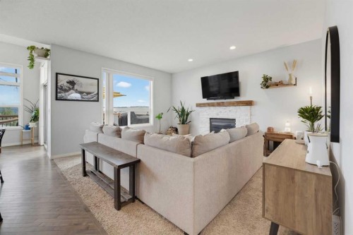 71 Pantego Way Nw, Calgary, AB - Indoor Photo Showing Living Room With Fireplace