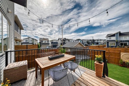 38 Precedence Glen, Cochrane, AB - Outdoor With Deck Patio Veranda With Exterior