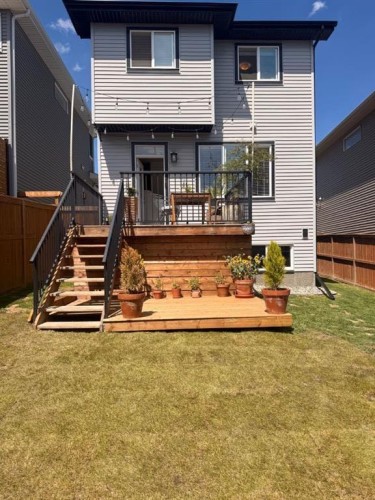38 Precedence Glen, Cochrane, AB - Outdoor With Deck Patio Veranda With Exterior