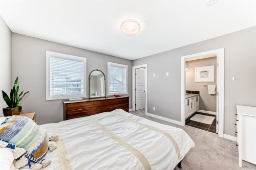 38 Precedence Glen, Cochrane, AB - Indoor Photo Showing Bedroom