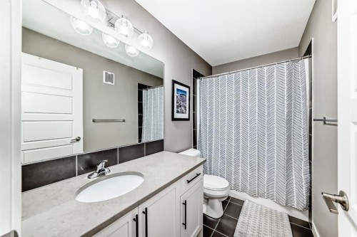 38 Precedence Glen, Cochrane, AB - Indoor Photo Showing Bathroom