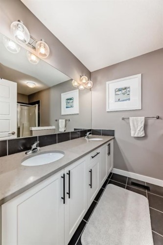 38 Precedence Glen, Cochrane, AB - Indoor Photo Showing Bathroom