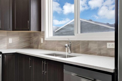 281 Cornerstone Passage Ne, Calgary, AB - Indoor Photo Showing Kitchen With Double Sink With Upgraded Kitchen