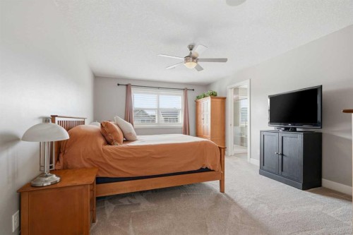 27 Sundown Way, Cochrane, AB - Indoor Photo Showing Bedroom