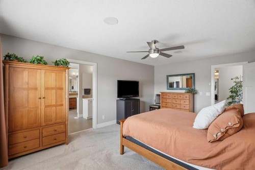 27 Sundown Way, Cochrane, AB - Indoor Photo Showing Bedroom