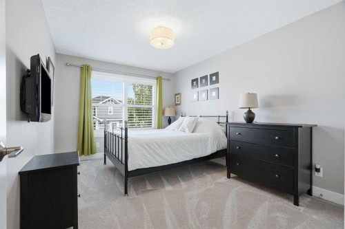 27 Sundown Way, Cochrane, AB - Indoor Photo Showing Bedroom