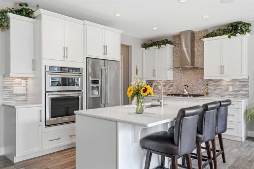 27 Sundown Way, Cochrane, AB - Indoor Photo Showing Kitchen With Stainless Steel Kitchen With Upgraded Kitchen