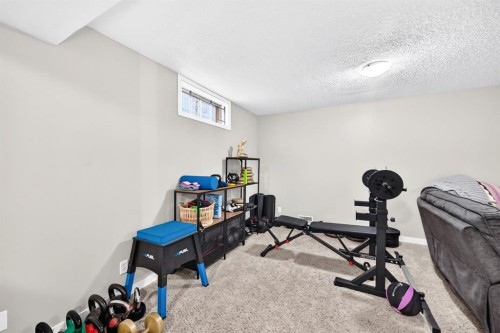 4824 41 Avenue Sw, Calgary, AB - Indoor Photo Showing Gym Room