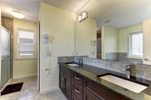 406 Silverado Boulevard Sw, Calgary, AB - Indoor Photo Showing Bathroom