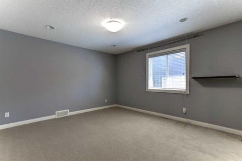 406 Silverado Boulevard Sw, Calgary, AB - Indoor Photo Showing Other Room